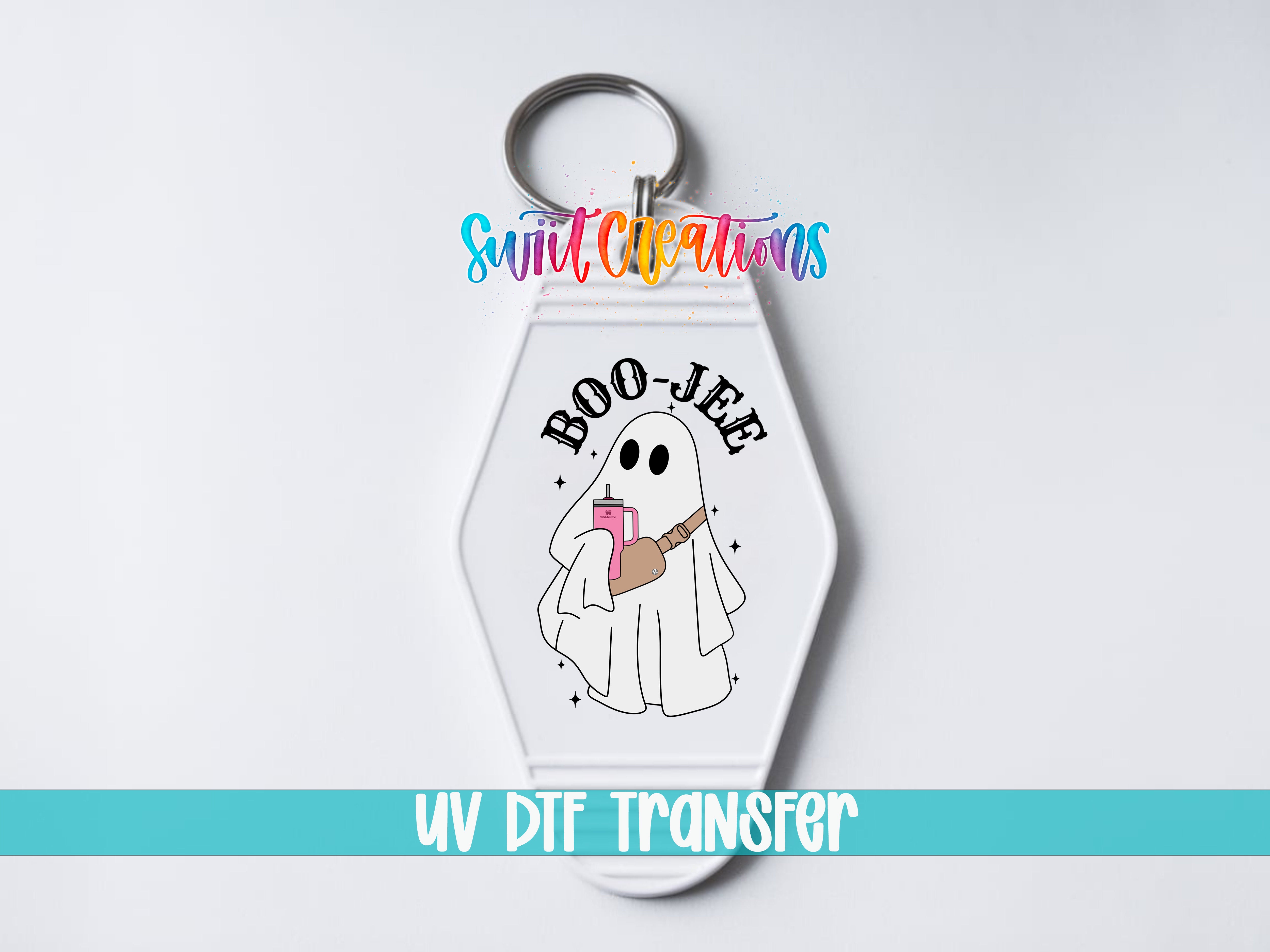 A keychain with a cartoon ghost holding a pink object and the text "BOO-JEE" printed on it.