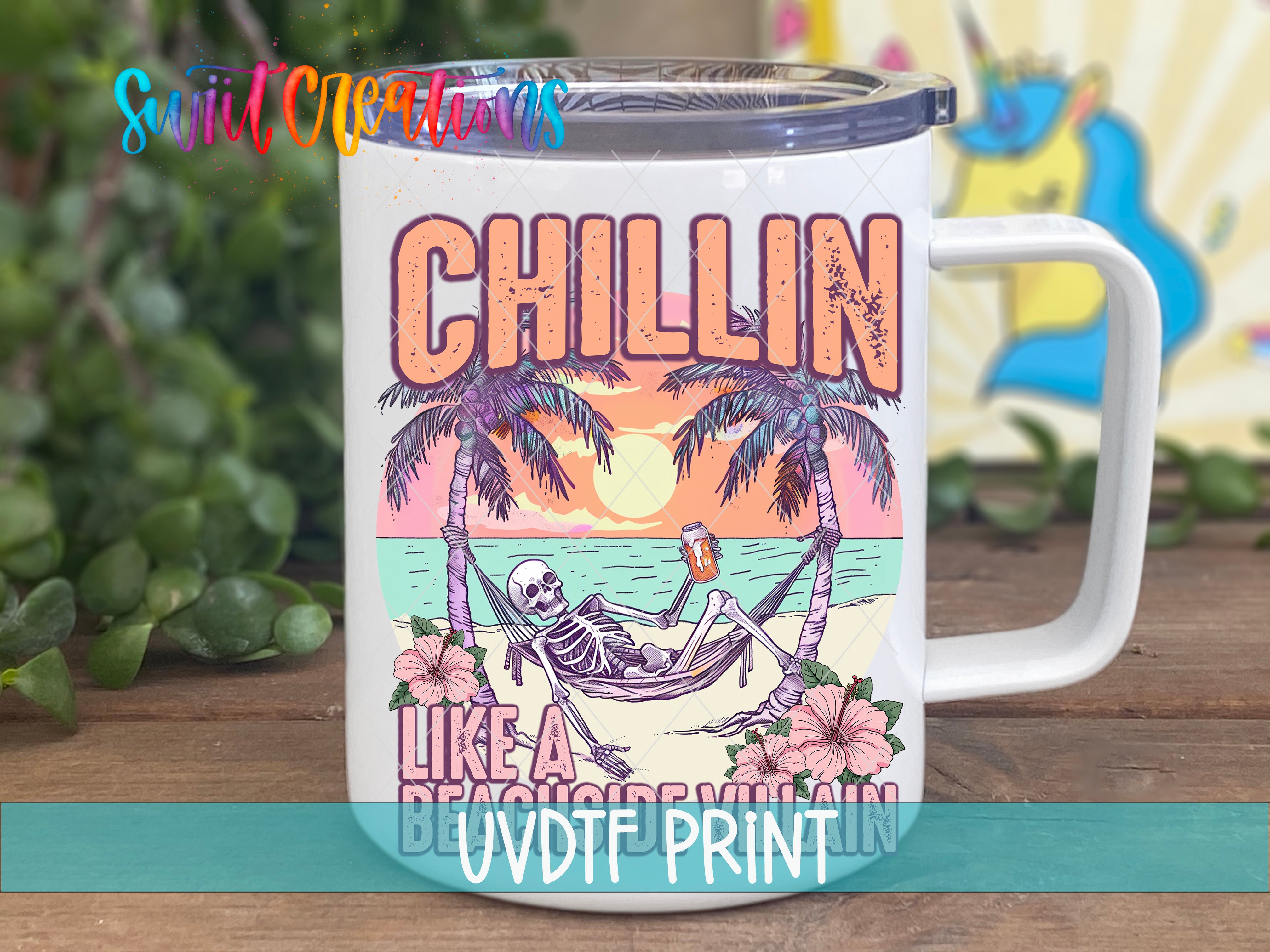 A white mug with a colorful graphic design featuring a skeleton relaxing in a hammock on a beach, with palm trees and a sunset in the background.