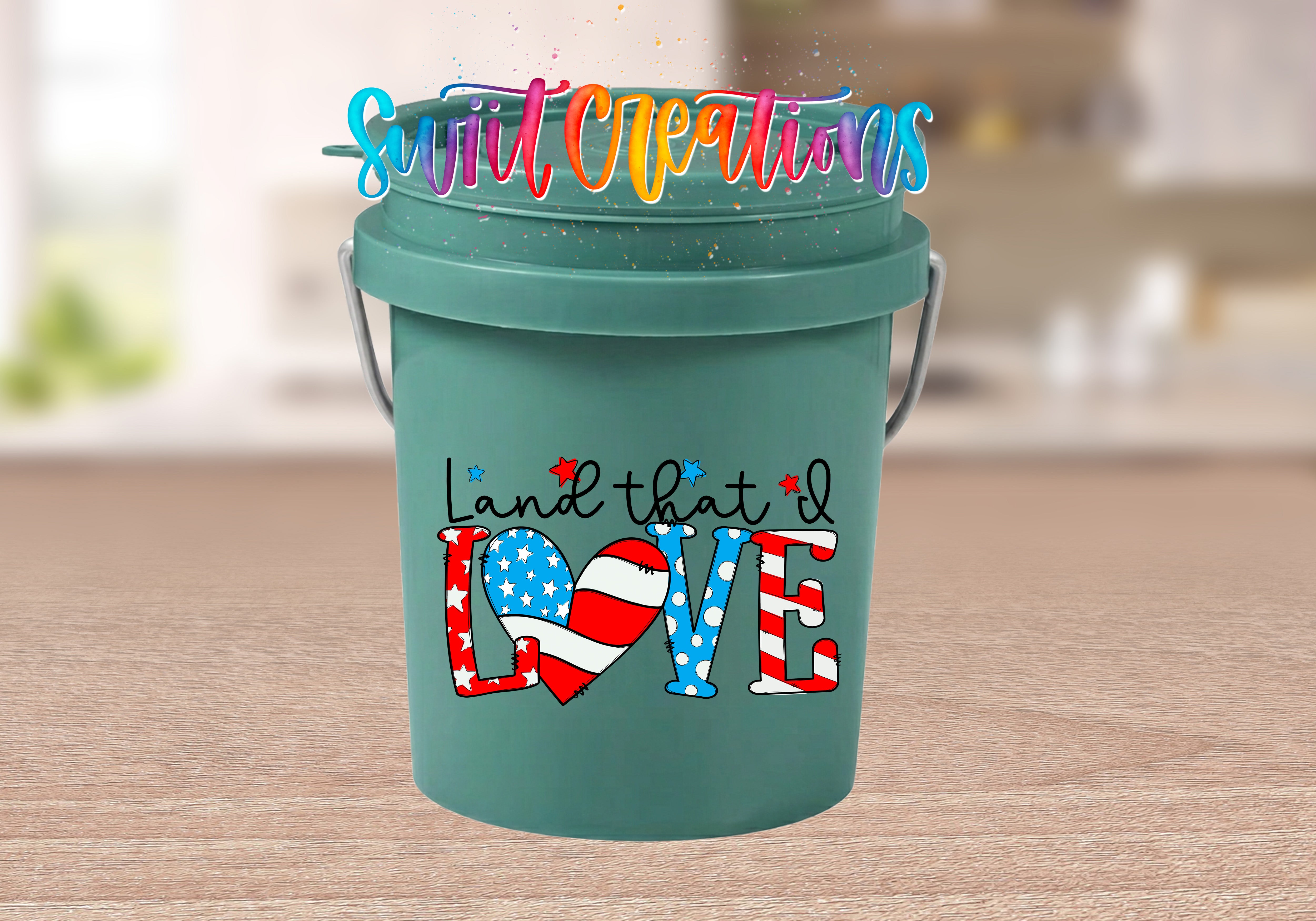 A green bucket with a patriotic design and text on it.