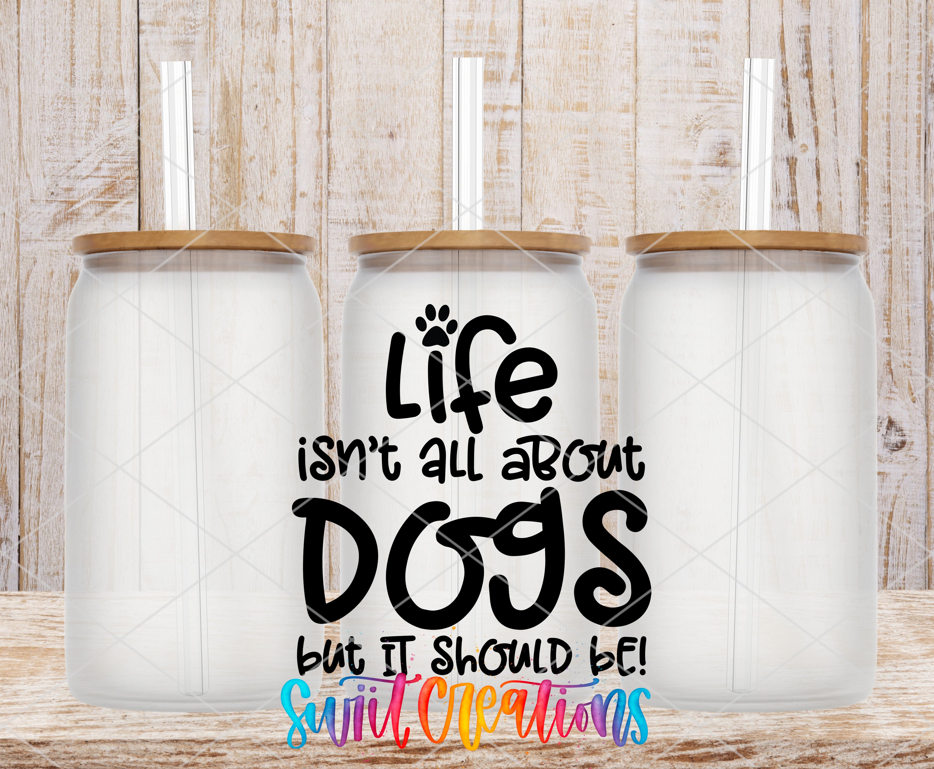 three glass jars with lids, each containing a straw, and there is a text overlay in the center that reads "Life isn't all about dogs but it should be! Switc creations".