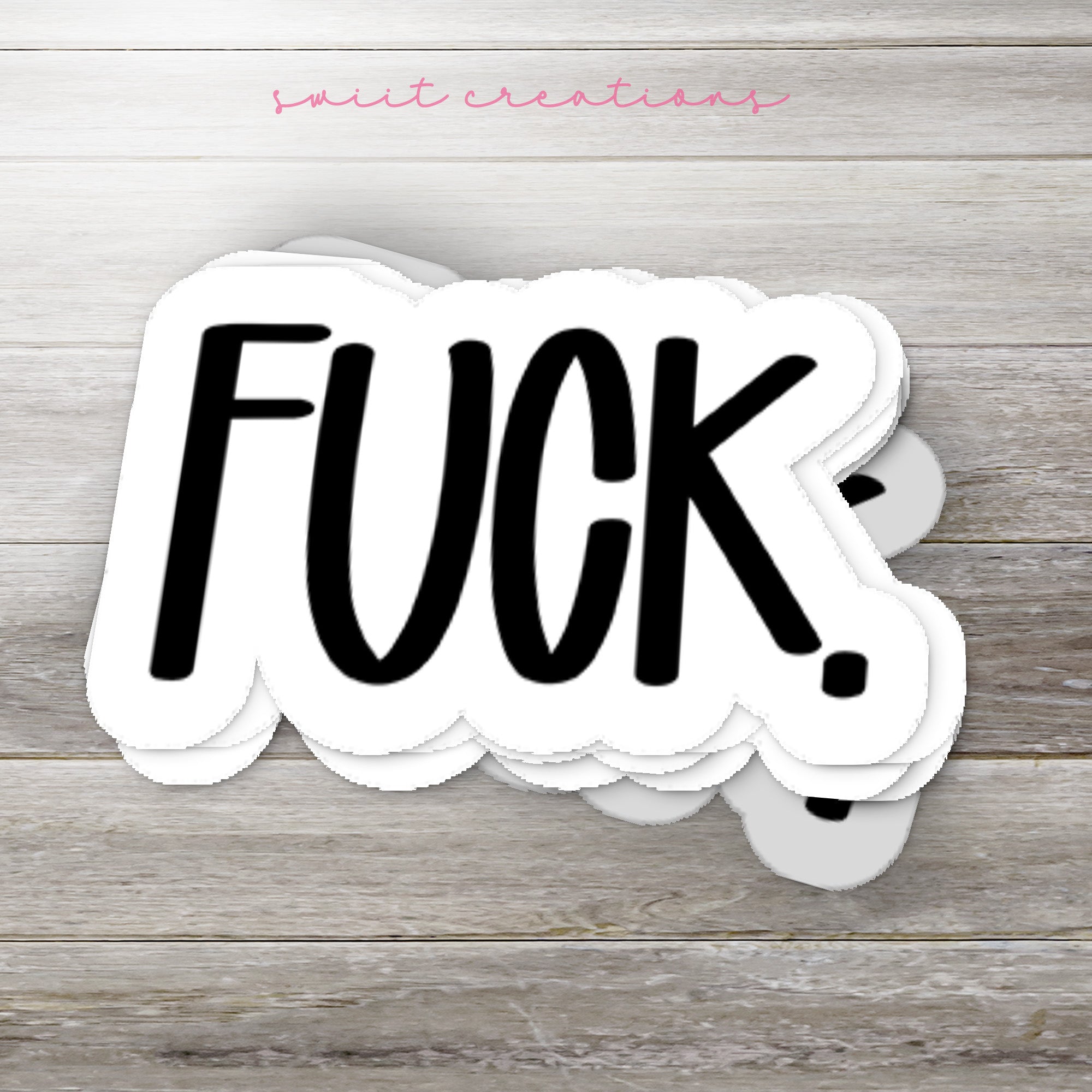 a sticker that says fuk on it