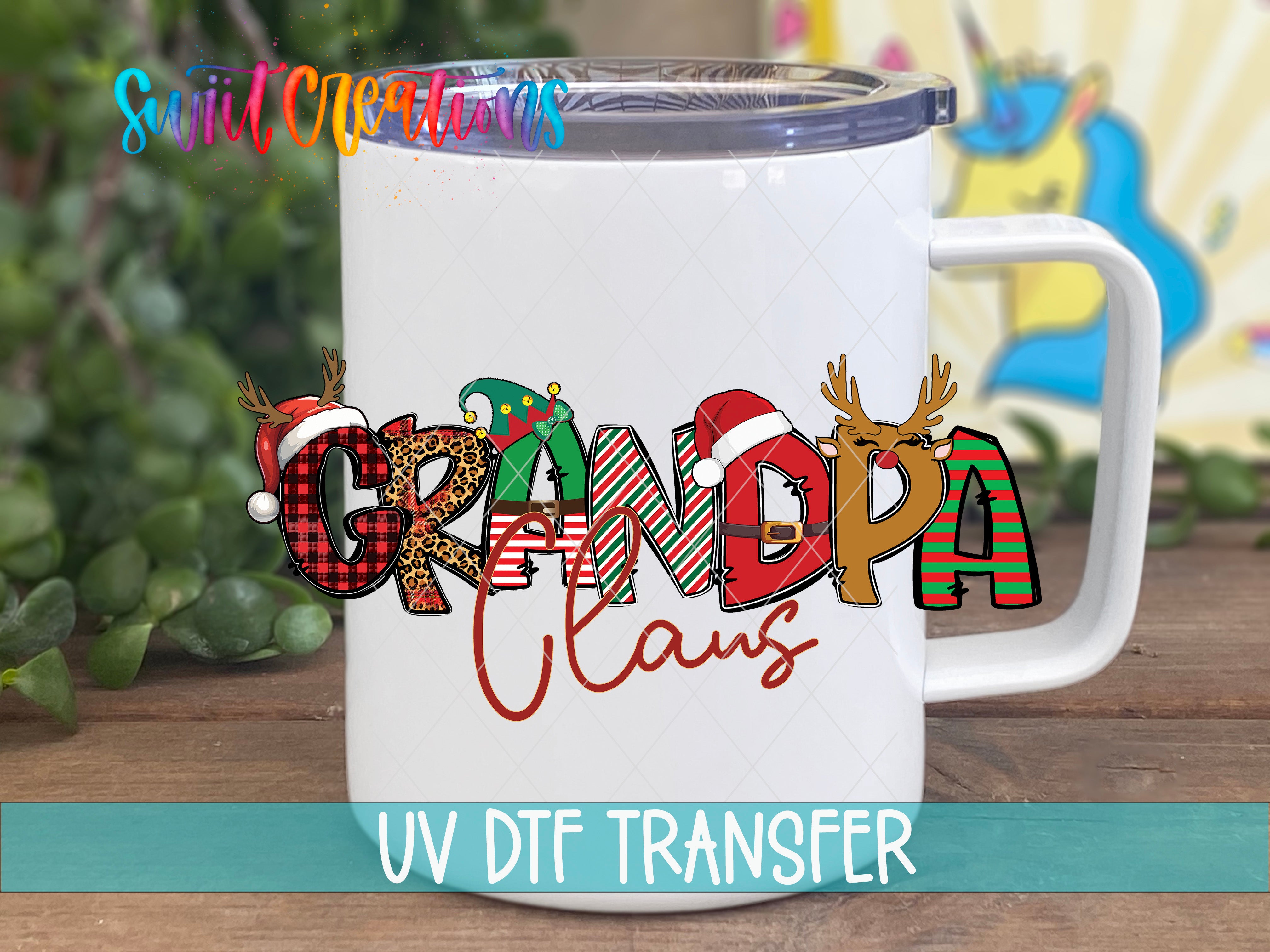 A white mug with the text "GRANDPA CLAUZ" printed on it, along with various Christmas-themed elements such as reindeer, Santa hats, and snowflakes.