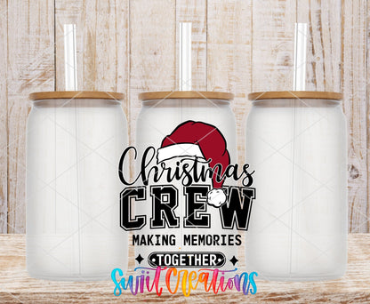 Swiit Creations UV DTF Christmas Crew Making Memories Together transfer shown on a clear glass can set