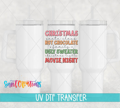Swiit Creations UV DTF Christmas Hot Chocolate Ugly Sweater Movie transfer shown on a white tumbler set