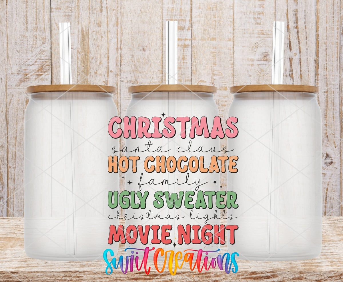 Swiit Creations UV DTF Christmas Hot Chocolate Ugly Sweater Movie transfer shown on a clear glass can set