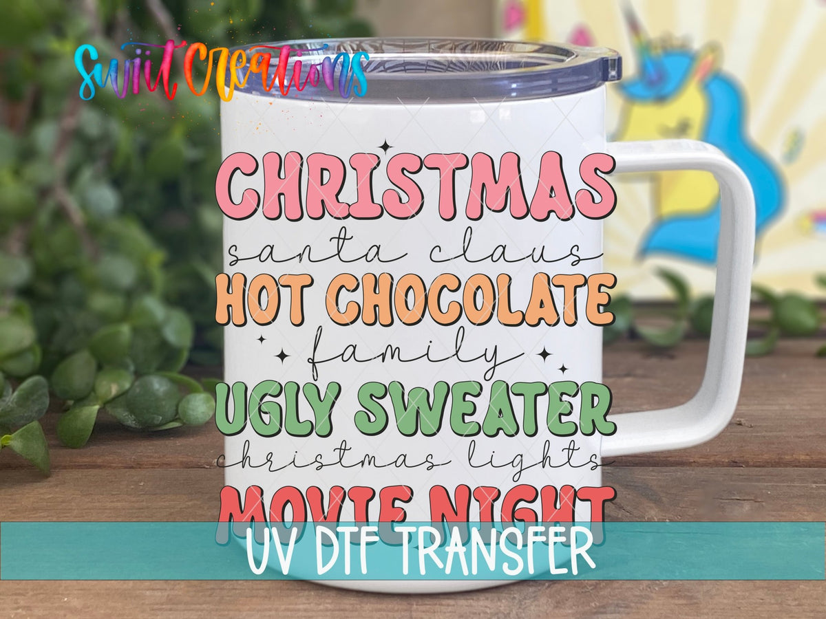 Swiit Creations UV DTF Christmas Hot Chocolate Ugly Sweater Movie transfer displayed on a white coffee mug
