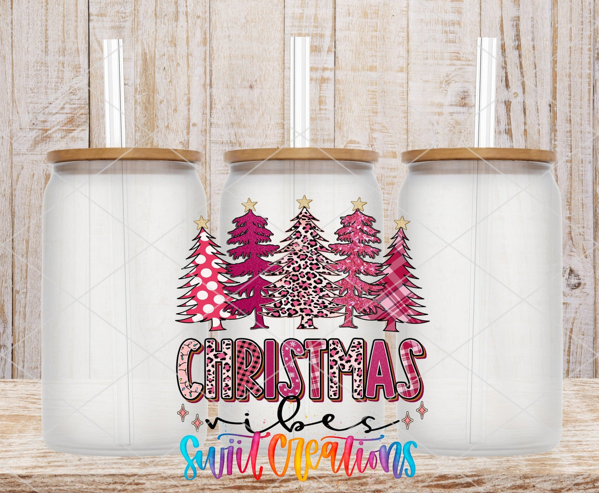 Christmas Vibes UV DTF transfer applied to a clear glass can set from Swiit Creations