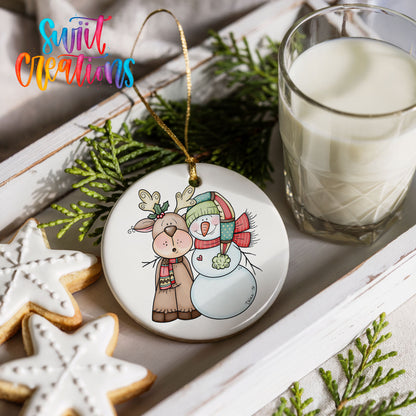 Reindeer and snowman ceramic ornament styled with cookies and milk