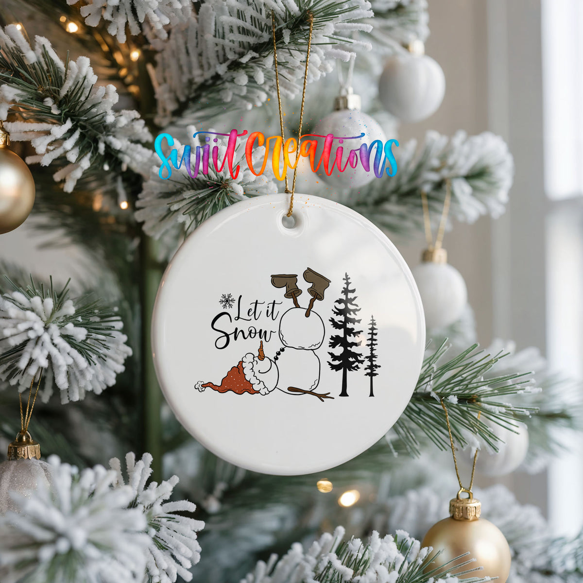Let It Snow snowman winter forest ceramic Christmas ornament hanging on a frosted Christmas tree