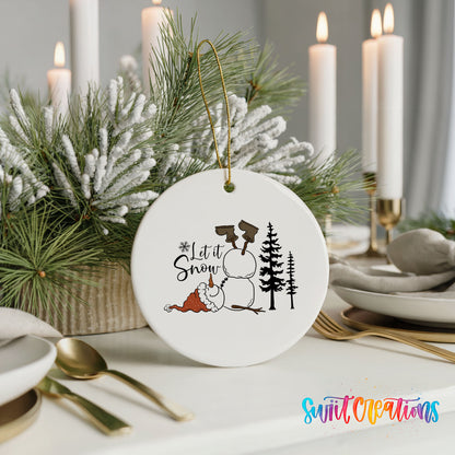 Let It Snow snowman winter forest ceramic Christmas ornament displayed with elegant holiday table decor
