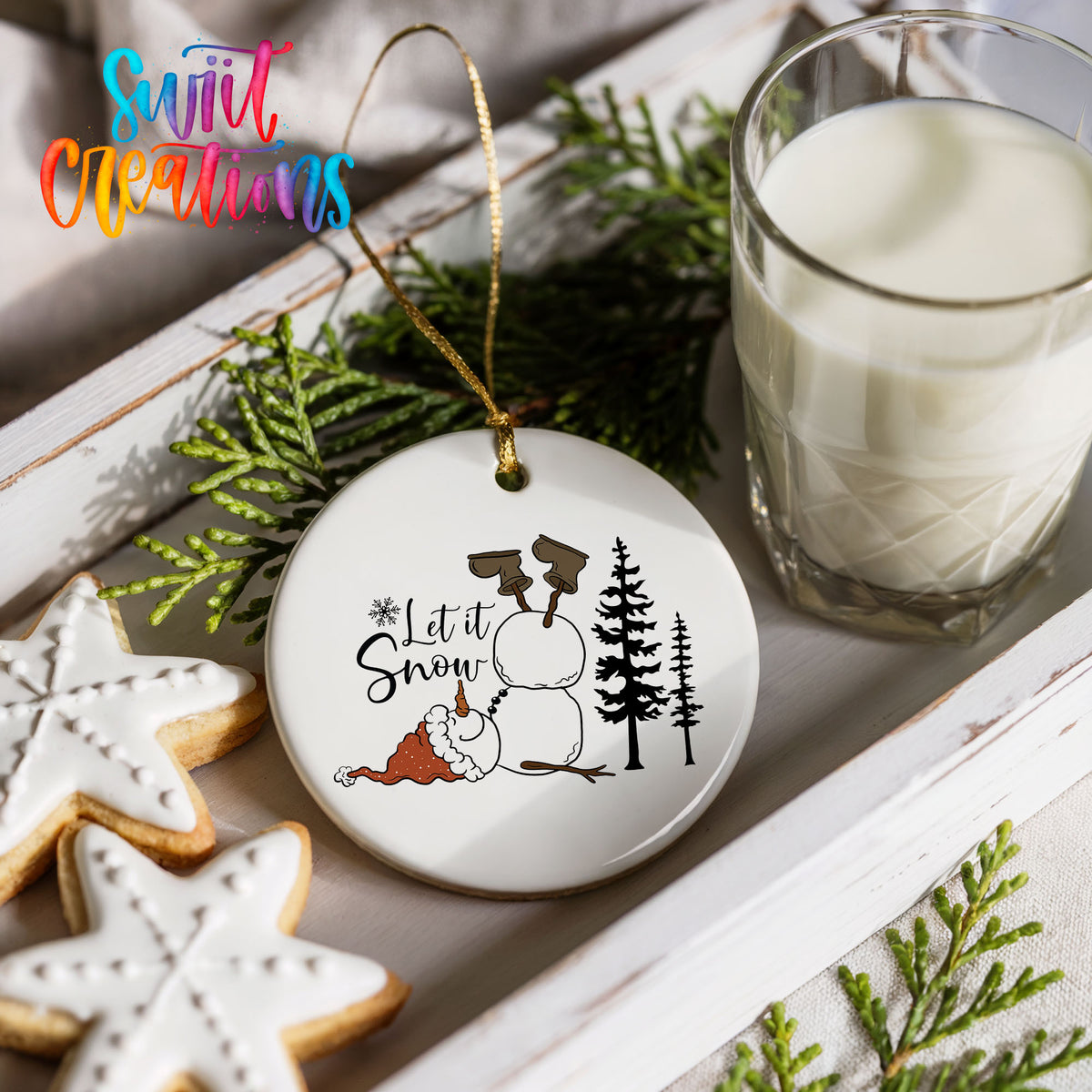 Let It Snow snowman winter forest ceramic Christmas ornament styled with cookies and milk