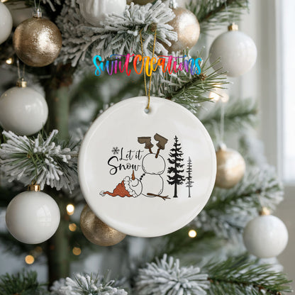 Let It Snow snowman winter forest ceramic Christmas ornament hanging on a frosted holiday tree