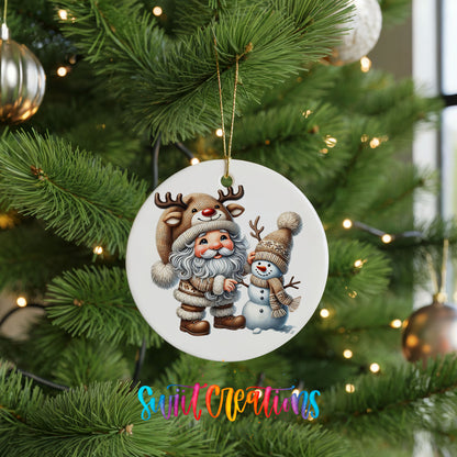 Whimsical Santa reindeer and snowman ceramic Christmas ornament hanging on a green Christmas tree