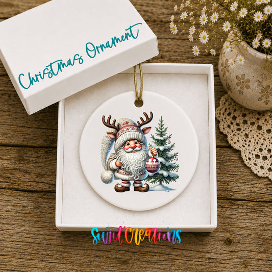 Cozy Santa with reindeer hat and Christmas tree ceramic ornament displayed in the included gift box
