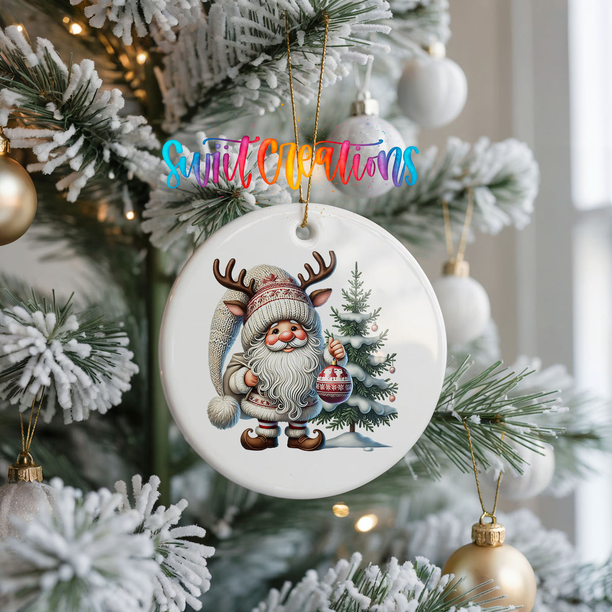 Cozy Santa with reindeer hat and Christmas tree ceramic ornament hanging on a frosted Christmas tree