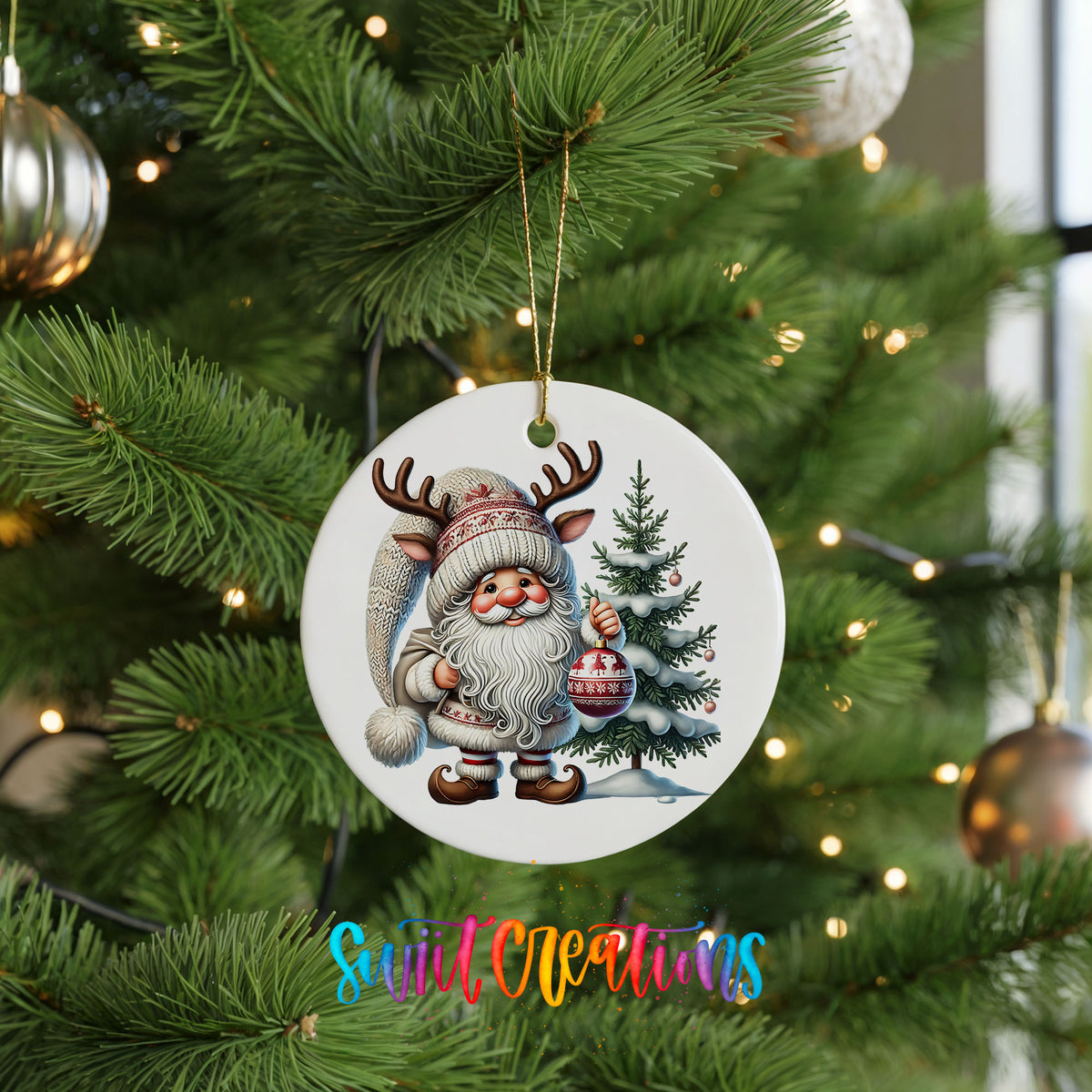 Cozy Santa with reindeer hat and Christmas tree ceramic ornament hanging on a green Christmas tree