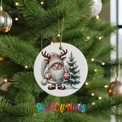 Cozy Santa with reindeer hat and Christmas tree ceramic ornament hanging on a green Christmas tree