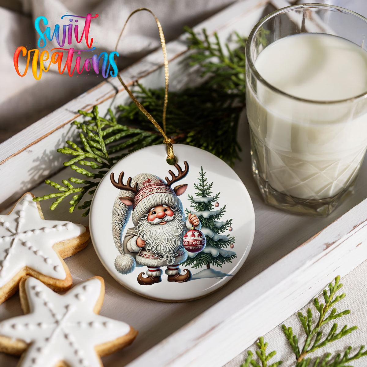 Cozy Santa with reindeer hat and Christmas tree ceramic ornament styled with cookies and milk
