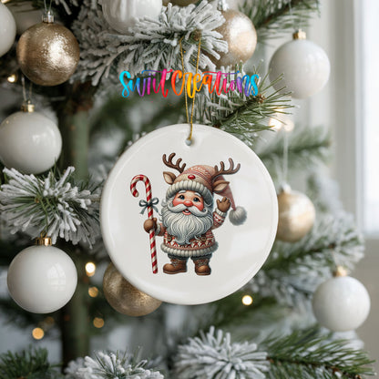 Whimsical Santa with candy cane ceramic Christmas ornament hanging on a frosted holiday tree