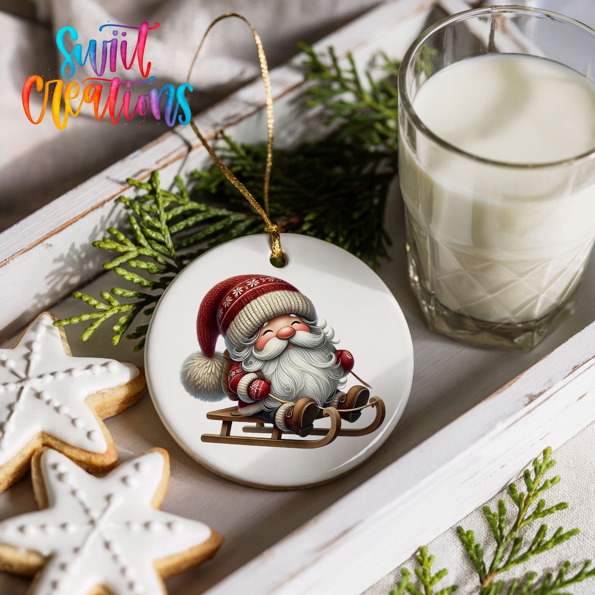 Sleeping Santa on a sled ceramic Christmas ornament styled with cookies and milk