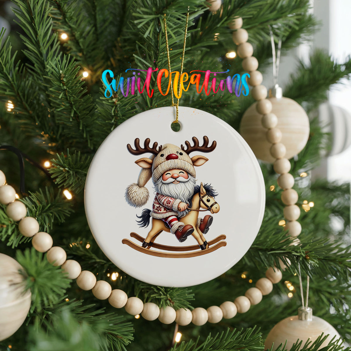 Whimsical Santa riding a rocking horse ceramic Christmas ornament hanging on a decorated Christmas tree