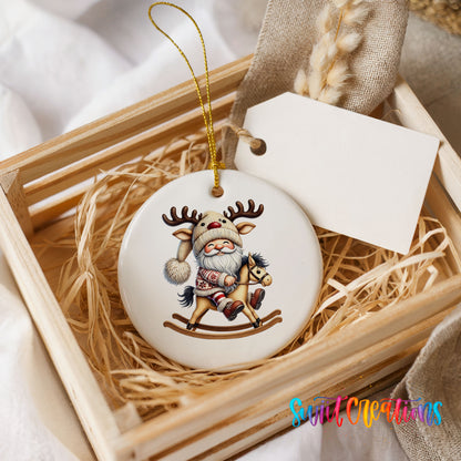 Whimsical Santa riding a rocking horse ceramic Christmas ornament displayed in a rustic wooden gift crate