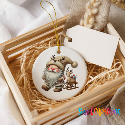 Santa pulling a reindeer sled ceramic Christmas ornament displayed in a rustic wooden gift crate