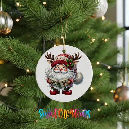 Santa reading a Christmas story ceramic ornament hanging on a green Christmas tree