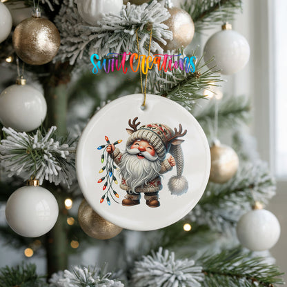 Santa holding colorful Christmas lights ceramic ornament hanging on a frosted holiday tree