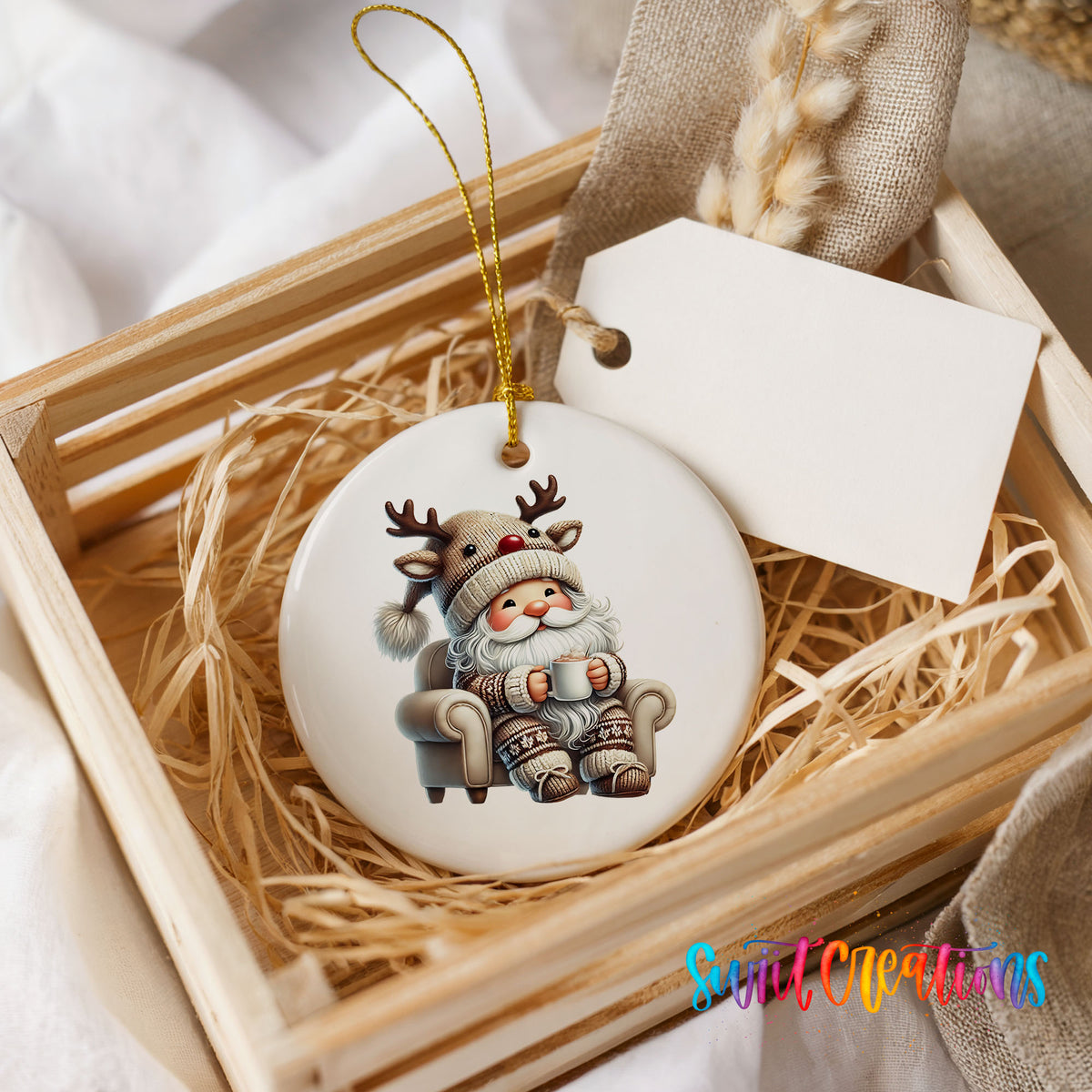 cozy Santa in a reindeer hat relaxing with a mug ceramic Christmas ornament displayed in a rustic wooden gift crate
