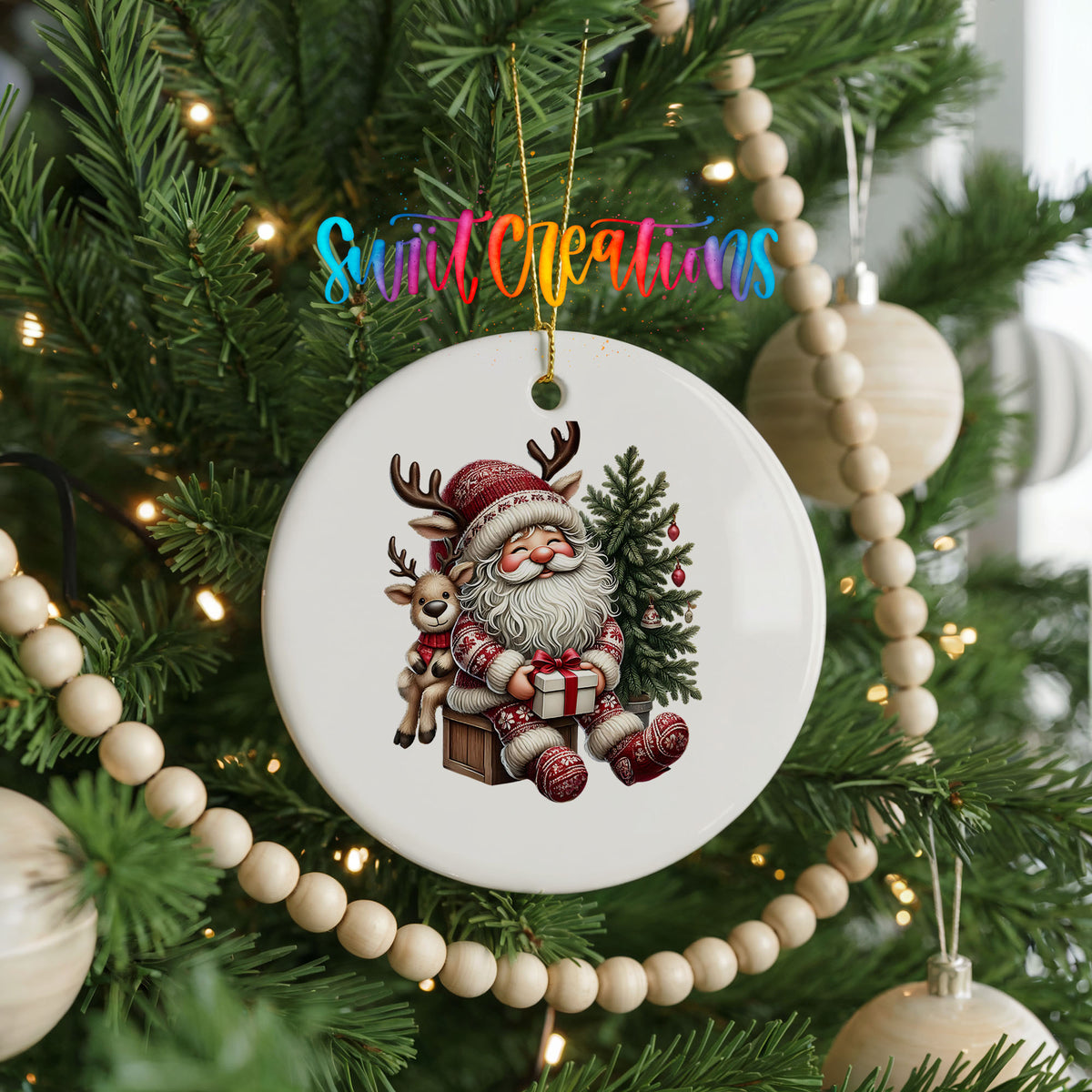 Round ceramic Christmas ornament featuring Santa with a reindeer beside a decorated Christmas tree, hanging on a decorated Christmas tree