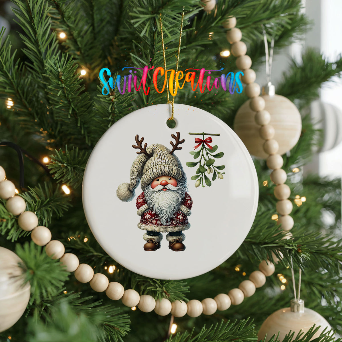 Round ceramic Christmas ornament featuring Santa standing beneath Christmas mistletoe, hanging on a decorated Christmas tree