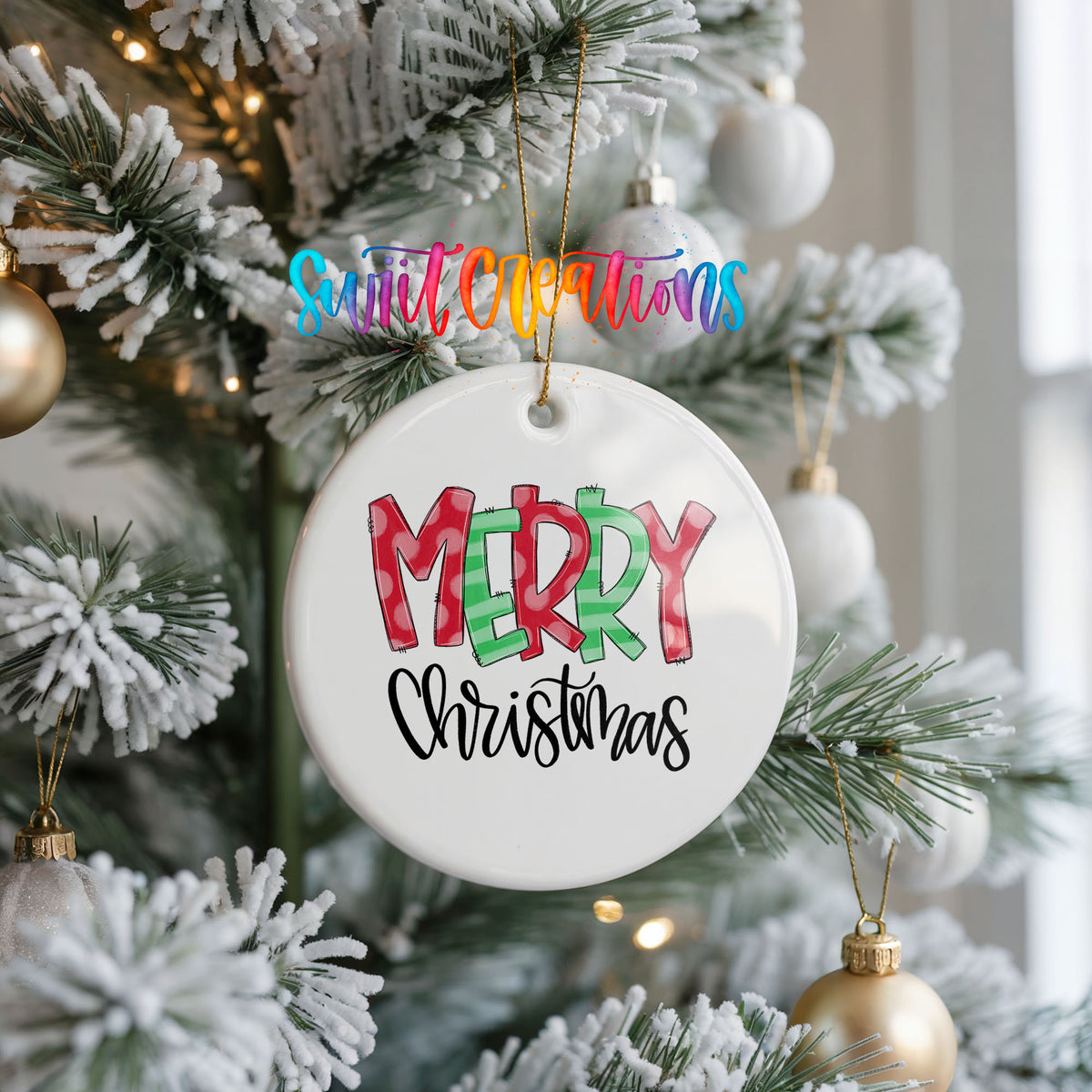 Round ceramic Christmas ornament featuring colorful patterned Merry Christmas typography, hanging on a frosted Christmas tree
