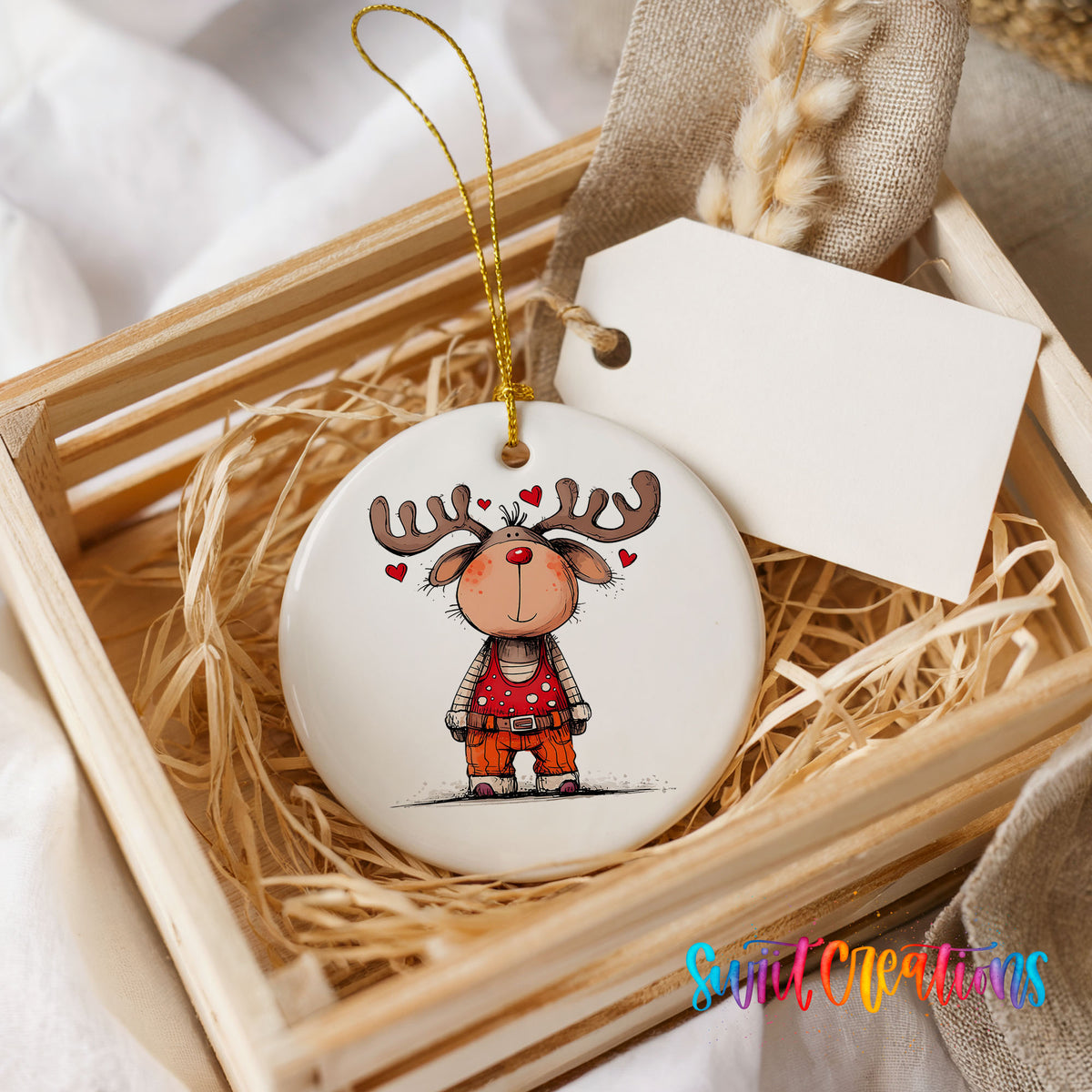 Reindeer Girl in Red Dress Christmas ornament presented in a rustic wooden gift crate
