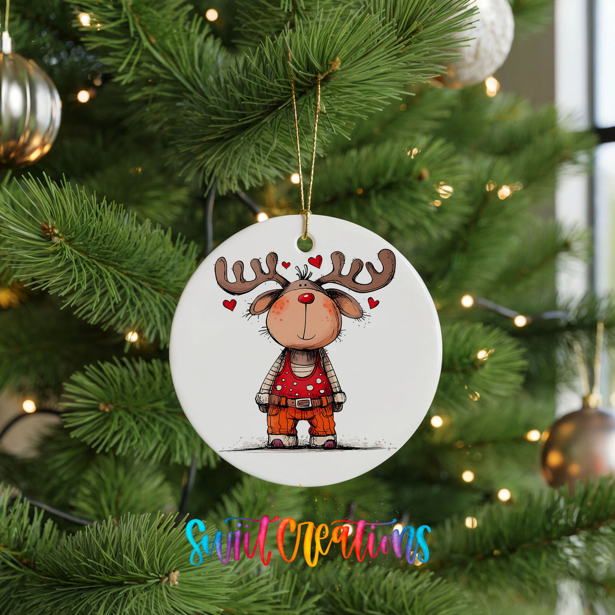 Reindeer Girl in Red Dress Christmas ornament hanging on a green Christmas tree