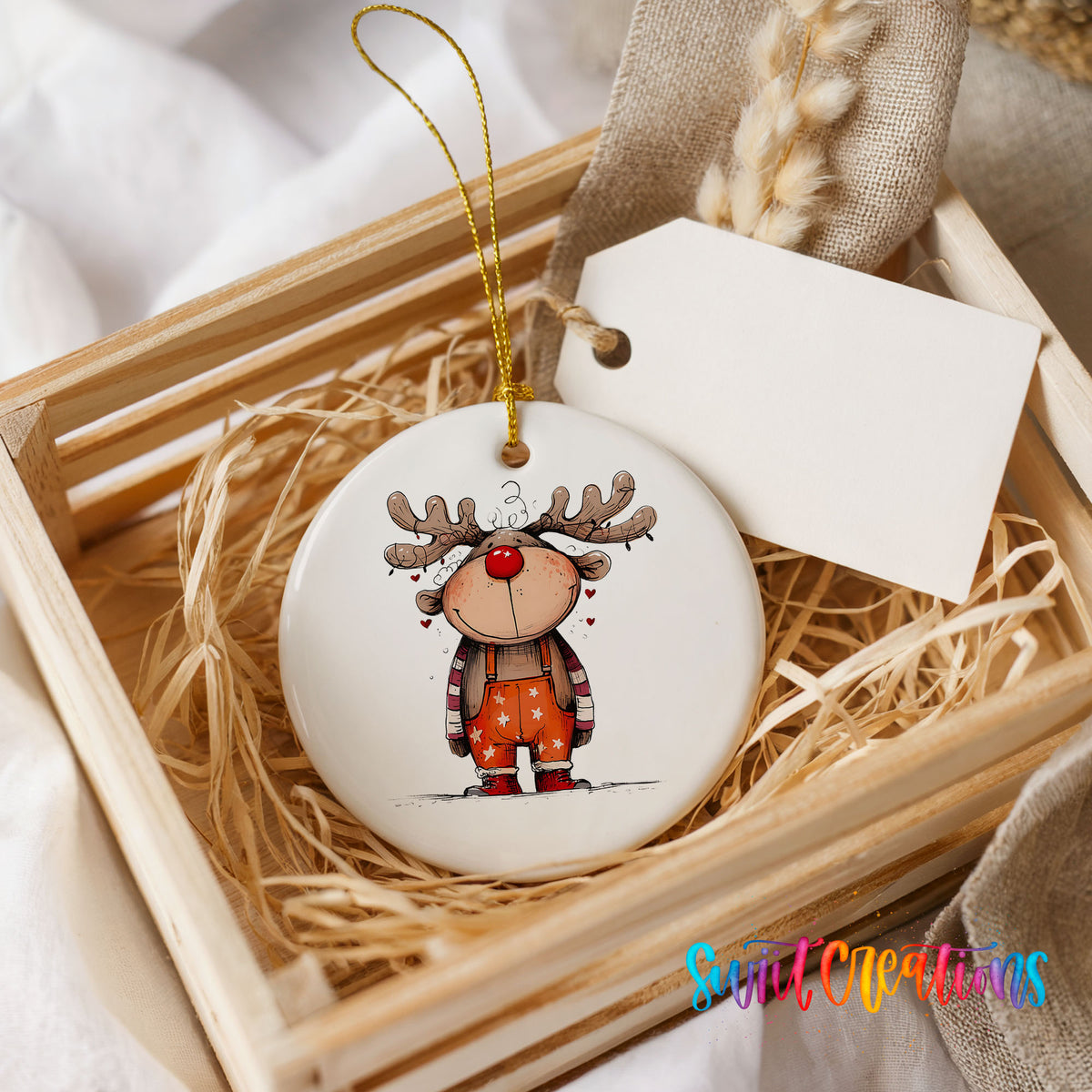 Cute Reindeer in Orange Sweater Christmas ornament presented in a rustic wooden gift crate