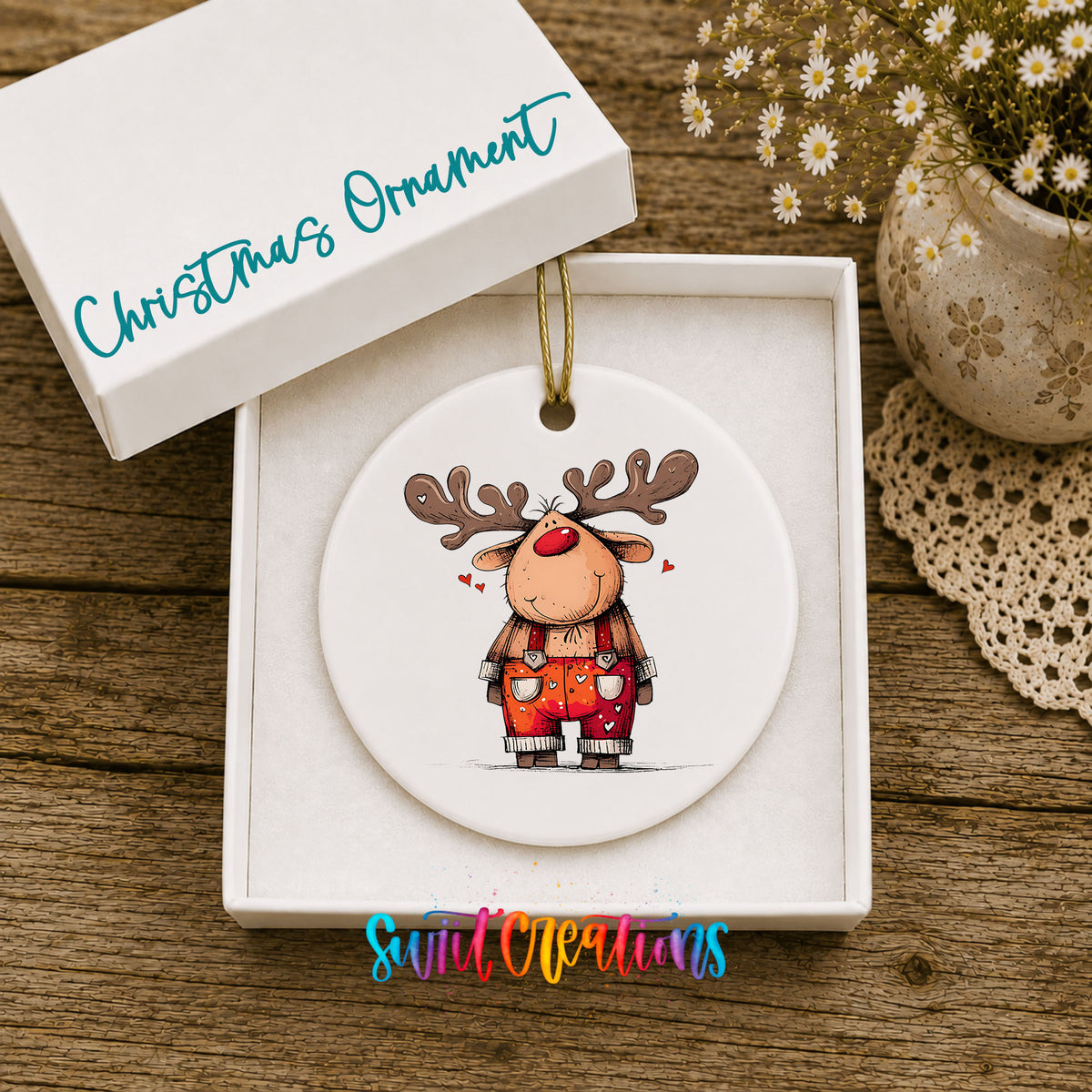 Reindeer in Red Plaid Overalls Christmas ornament displayed in an included gift box
