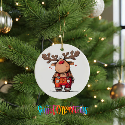 Reindeer in Red Plaid Overalls Christmas ornament hanging on a green Christmas tree