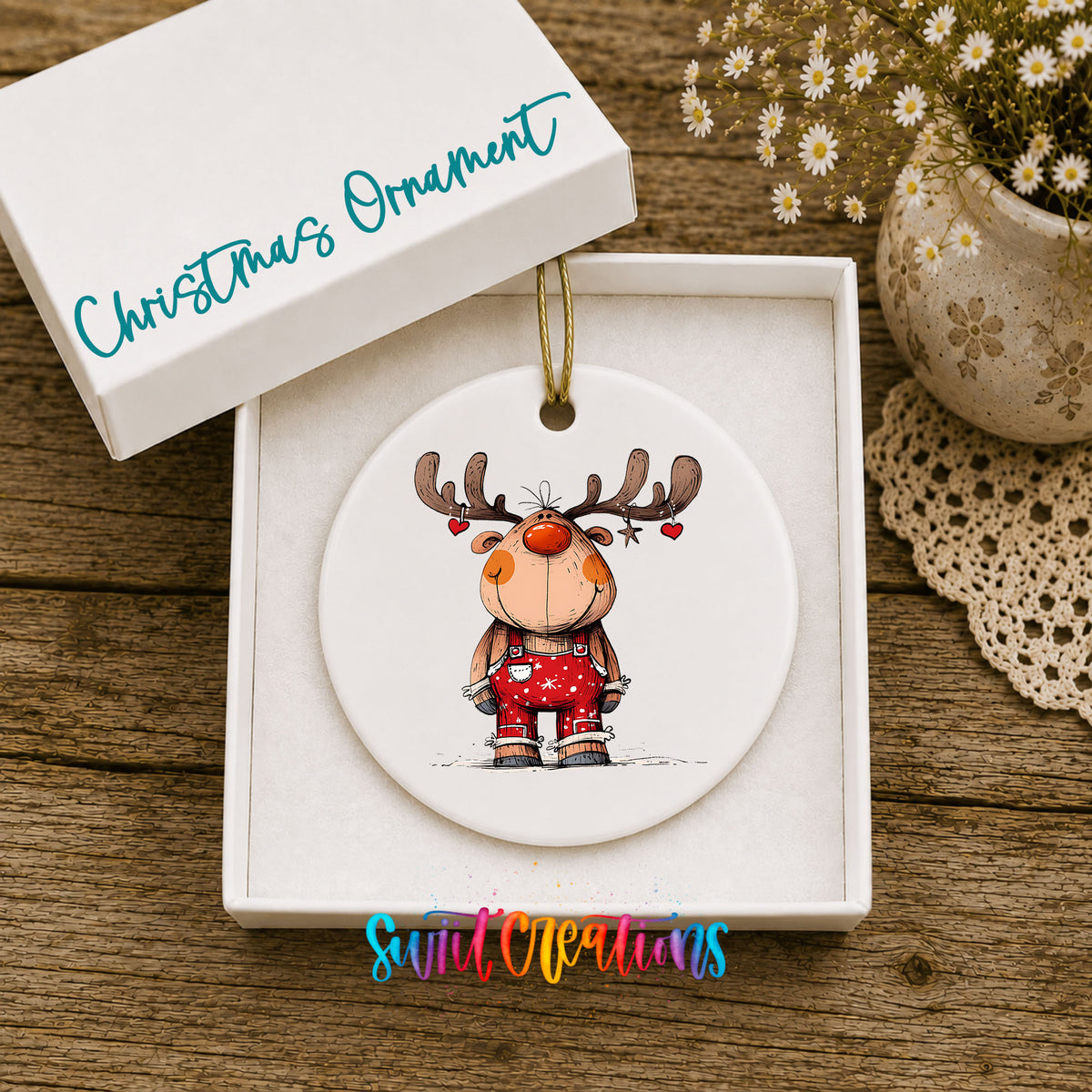Reindeer in Red Plaid Sweater Christmas ornament displayed in an included gift box