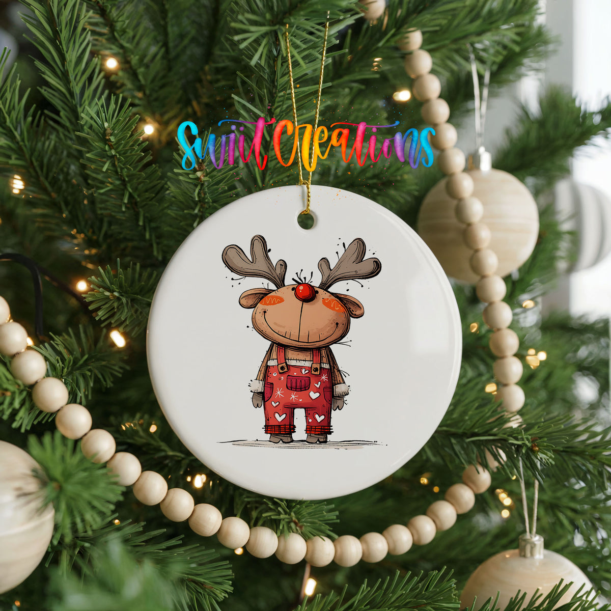 Reindeer in Red Plaid Outfit Christmas ornament hanging on a decorated Christmas tree