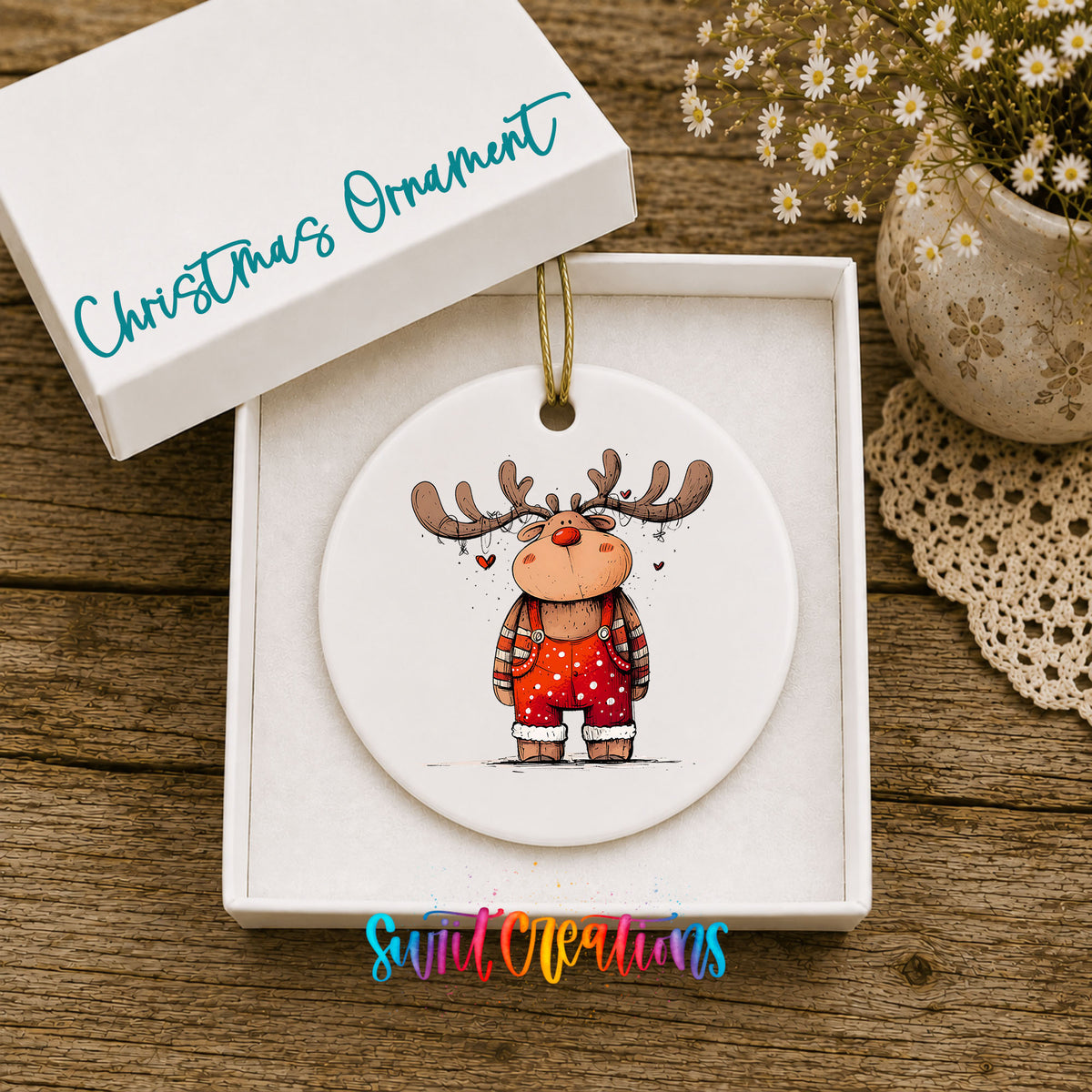Reindeer in Red Sweater and Black Boots Christmas ornament displayed in an included gift box