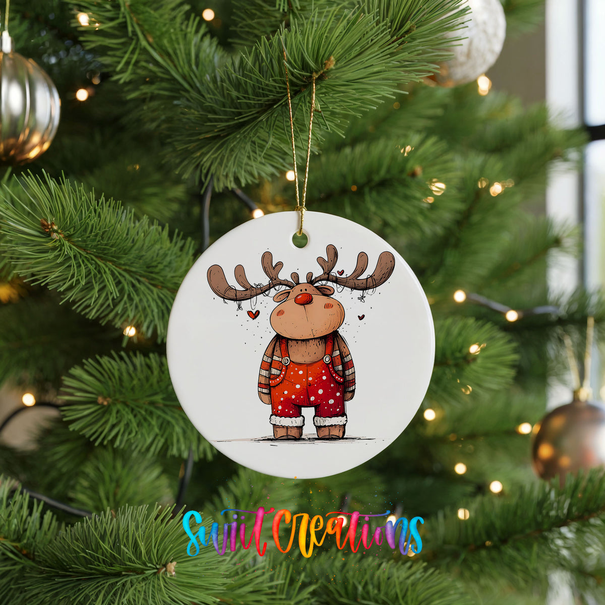 Reindeer in Red Sweater and Black Boots Christmas ornament hanging on a green Christmas tree
