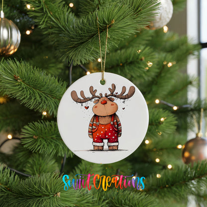 Reindeer in Red Sweater and Black Boots Christmas ornament hanging on a green Christmas tree