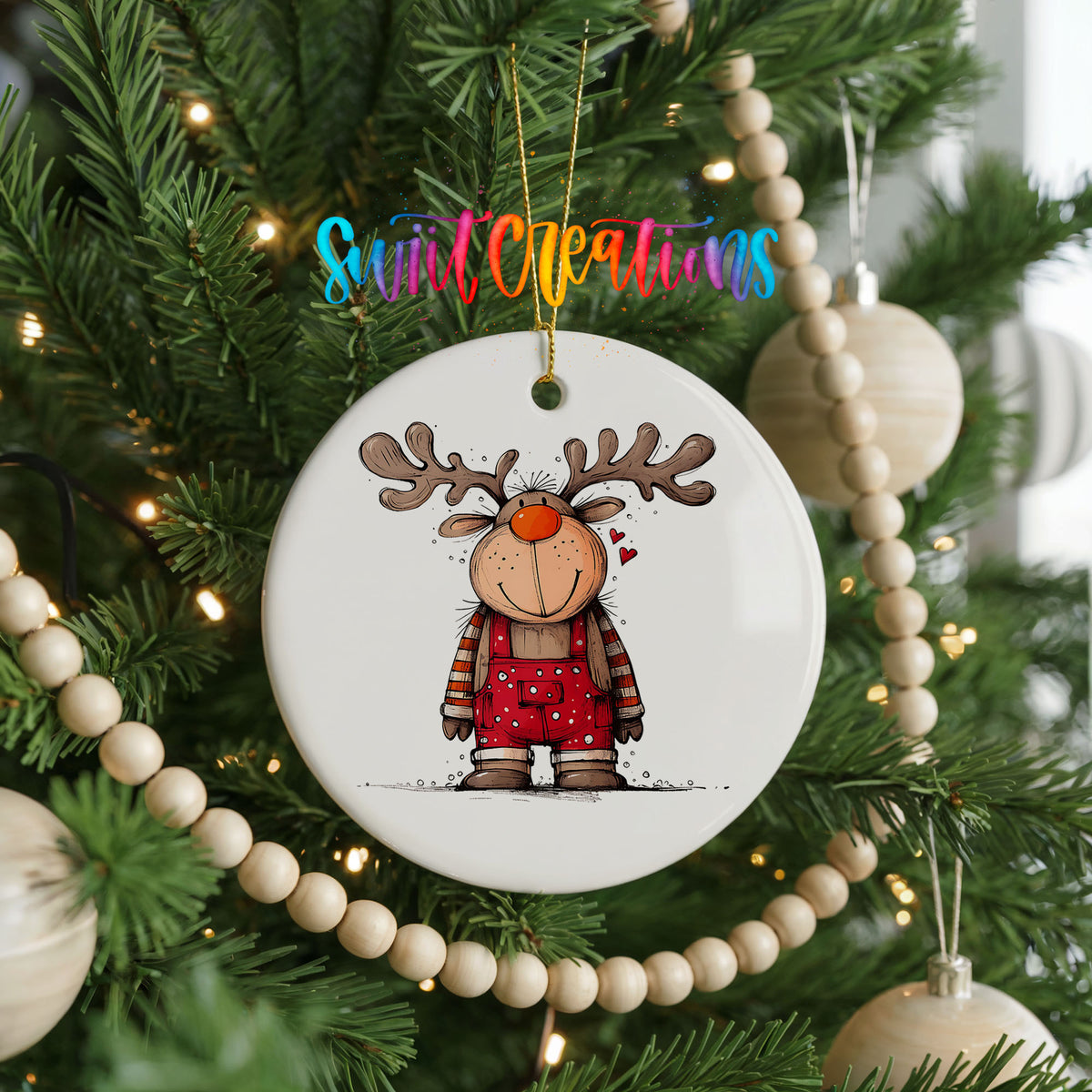 Reindeer Girl in Red Plaid Dress Christmas ornament hanging on a decorated Christmas tree