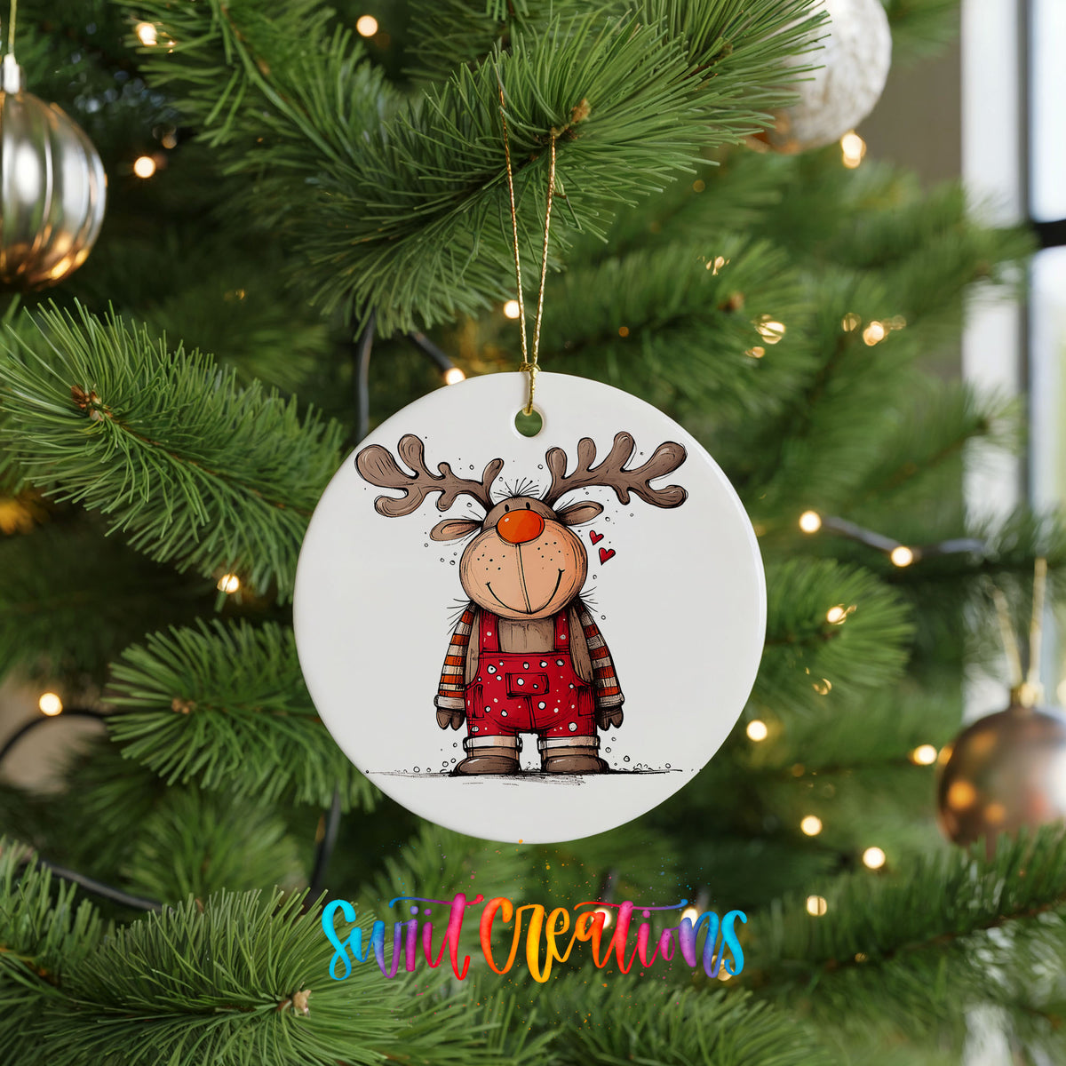 Reindeer Girl in Red Plaid Dress Christmas ornament hanging on a green Christmas tree