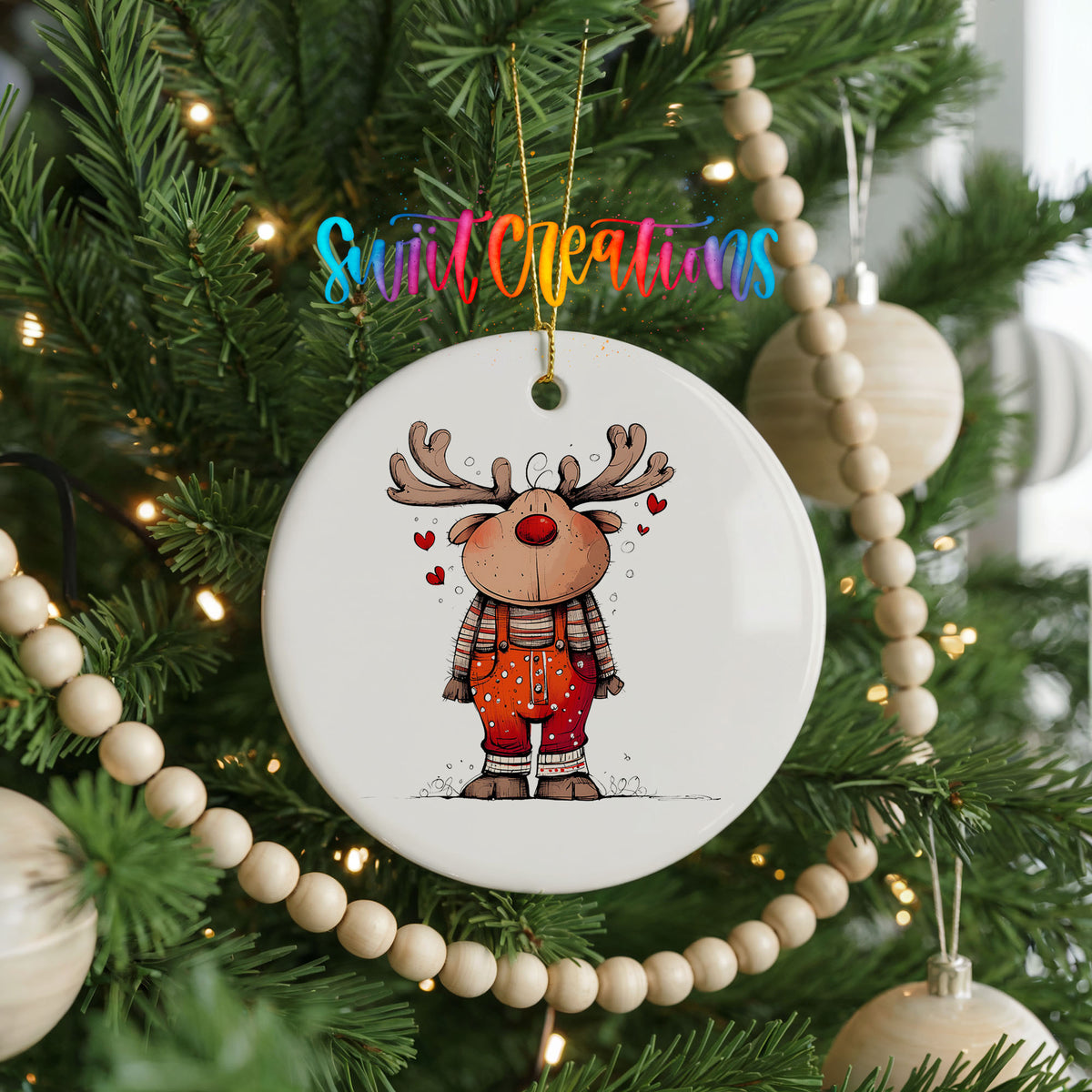 Reindeer in Red Plaid Shirt Christmas ornament hanging on a decorated Christmas tree
