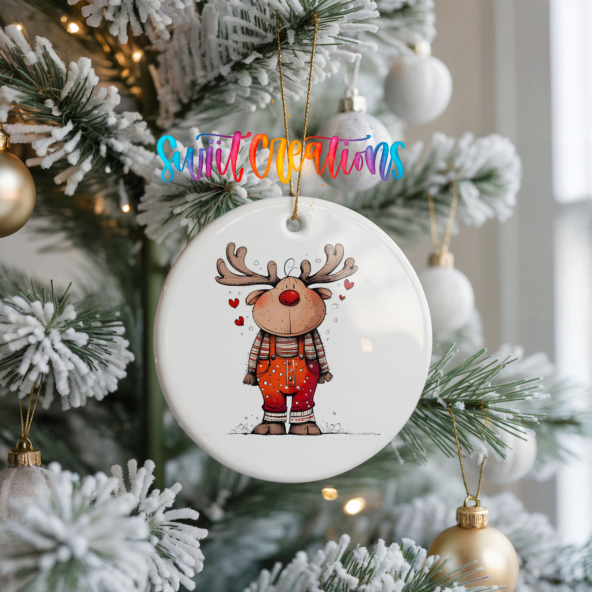 Reindeer in Red Plaid Shirt Christmas ornament hanging on a frosted Christmas tree