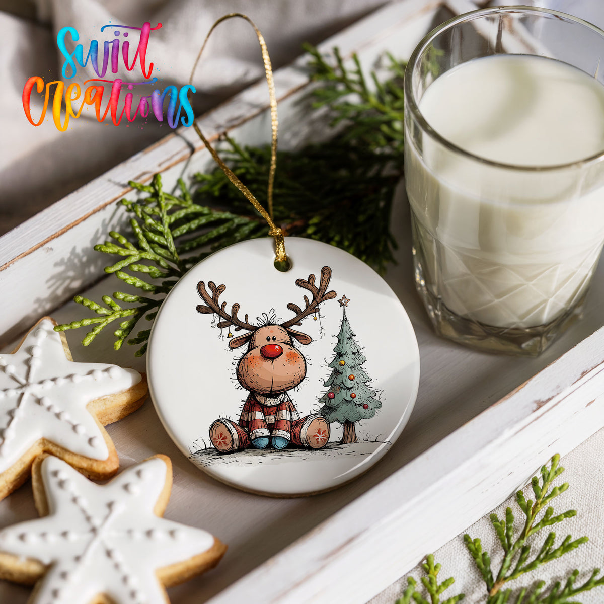 Sitting Reindeer Beside Christmas Tree Christmas ornament styled with cookies and milk