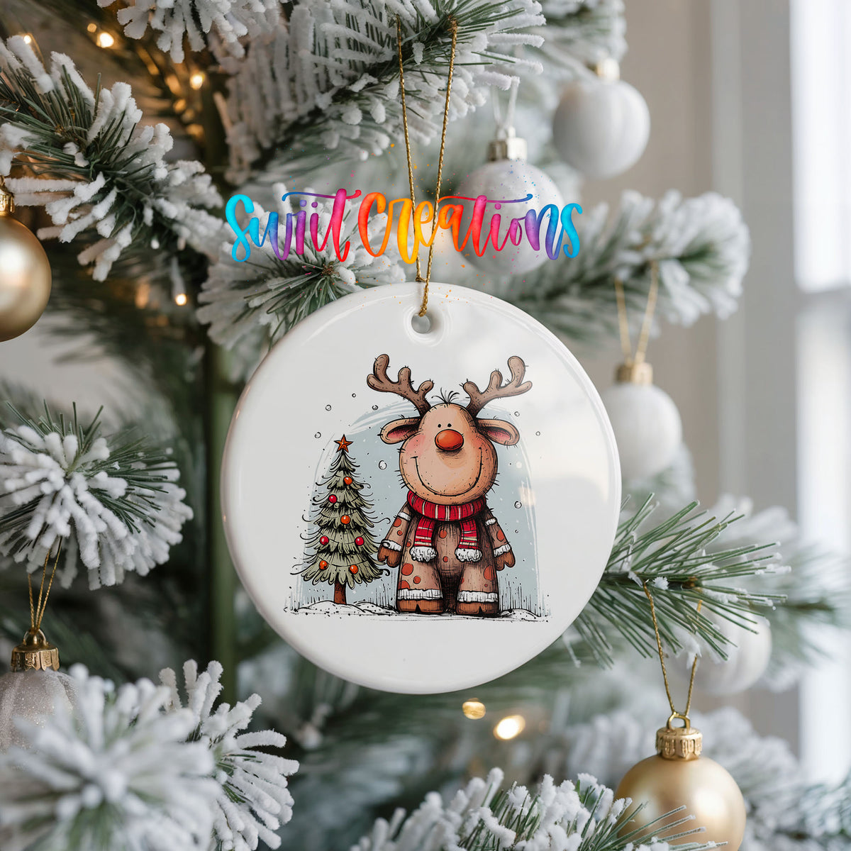 Reindeer in Red Scarf with Pine Trees Christmas ornament hanging on a frosted Christmas tree