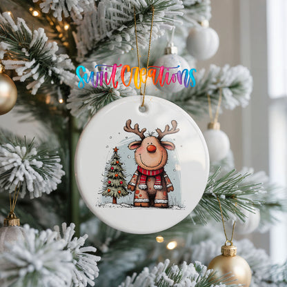 Reindeer in Red Scarf with Pine Trees Christmas ornament hanging on a frosted Christmas tree